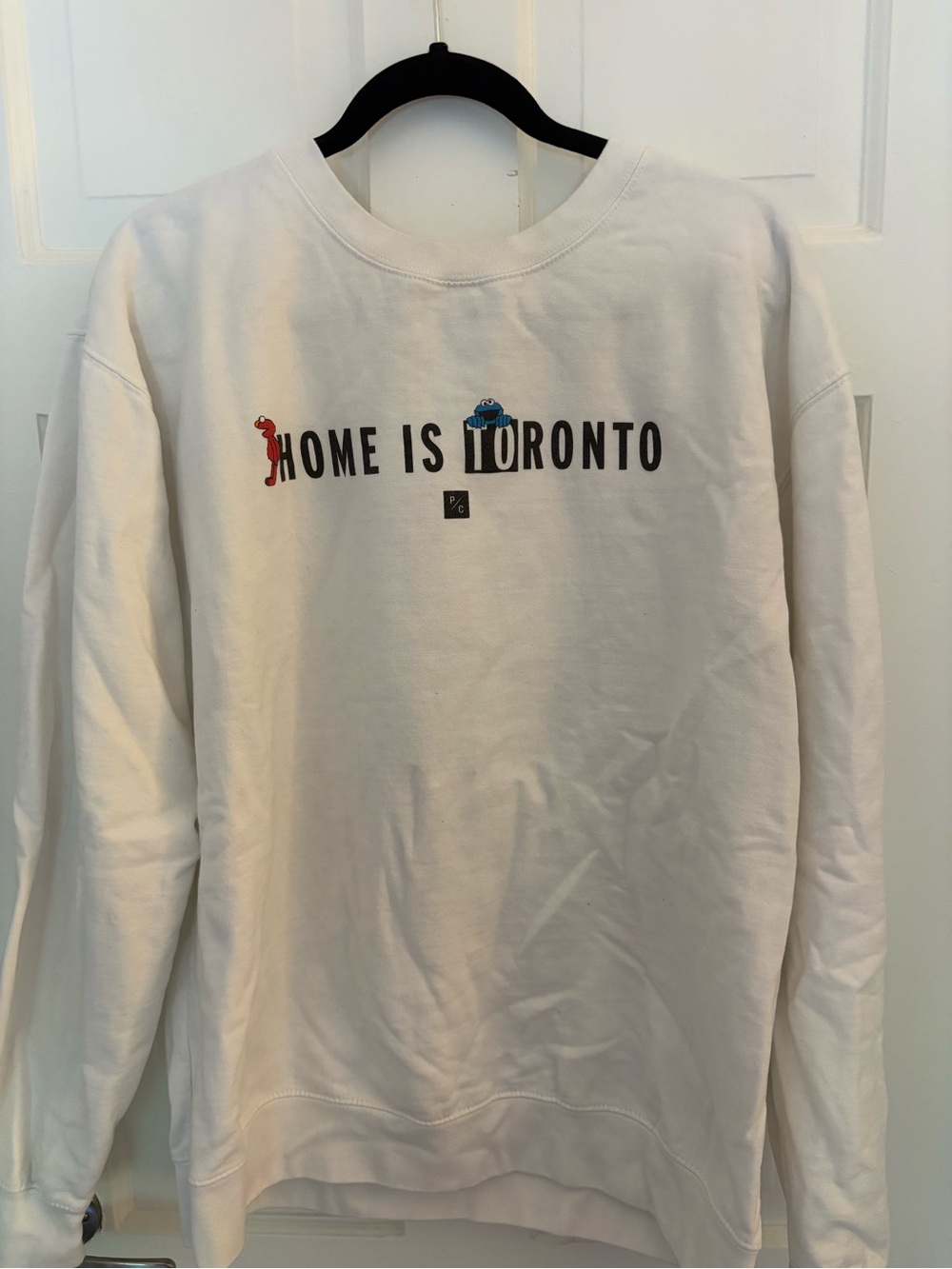 PEACE COLLECTIVE Home Is Toronto Crewneck Sweatshirt X SESAME STREET - White